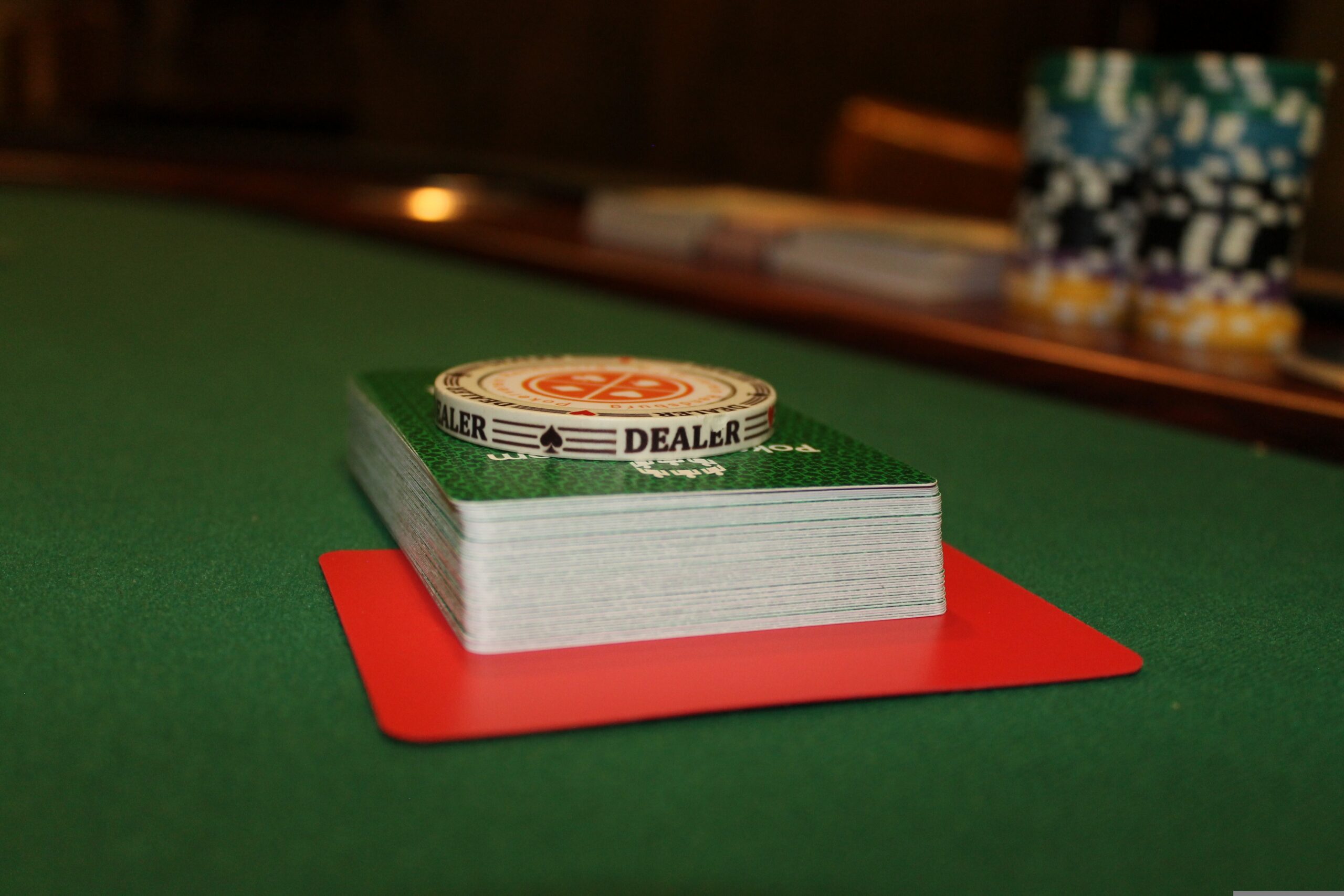 Poker table with cards and chips - big blind defense strategy
